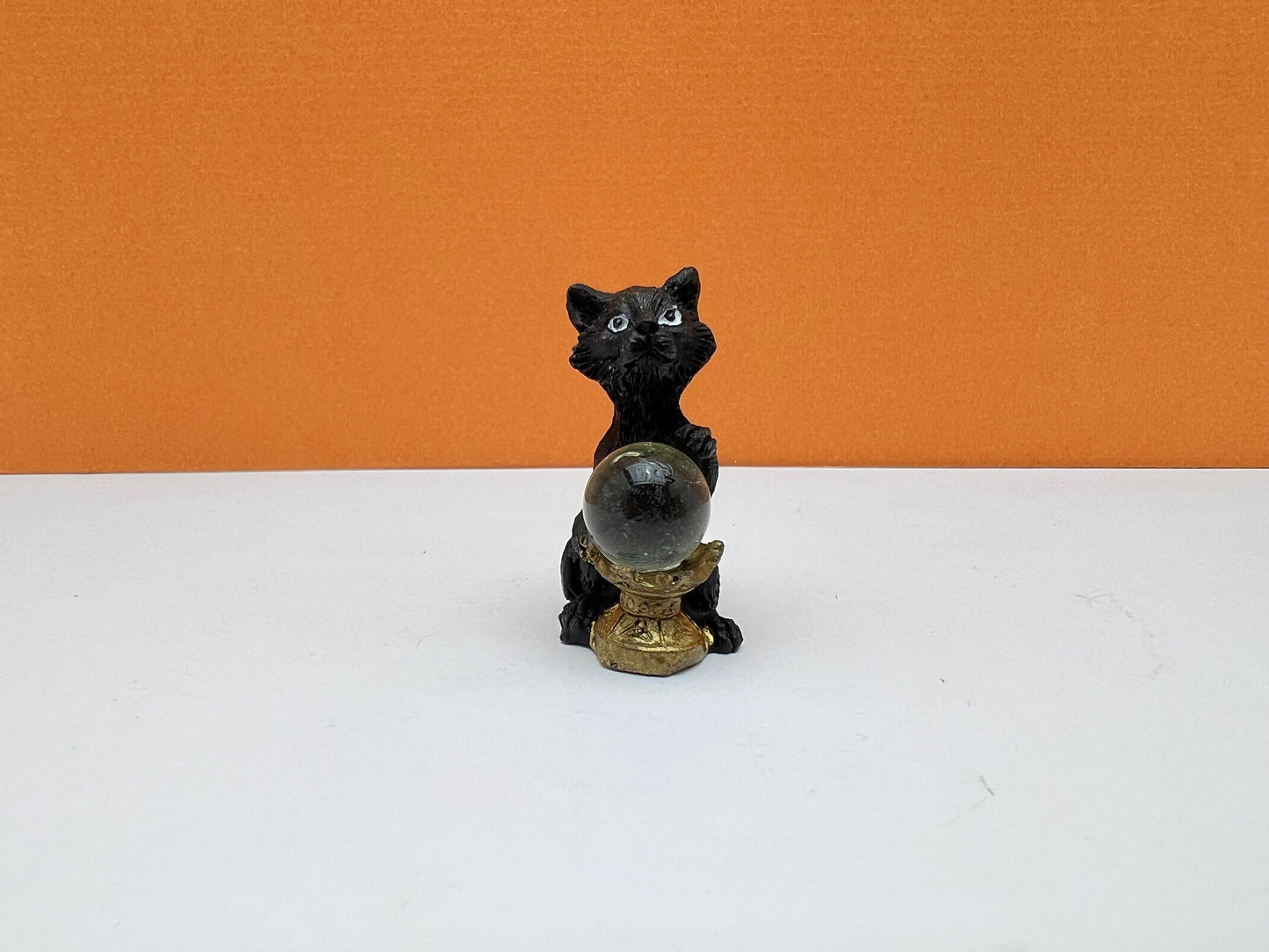 Cat Holding Crystal Ball Halloween