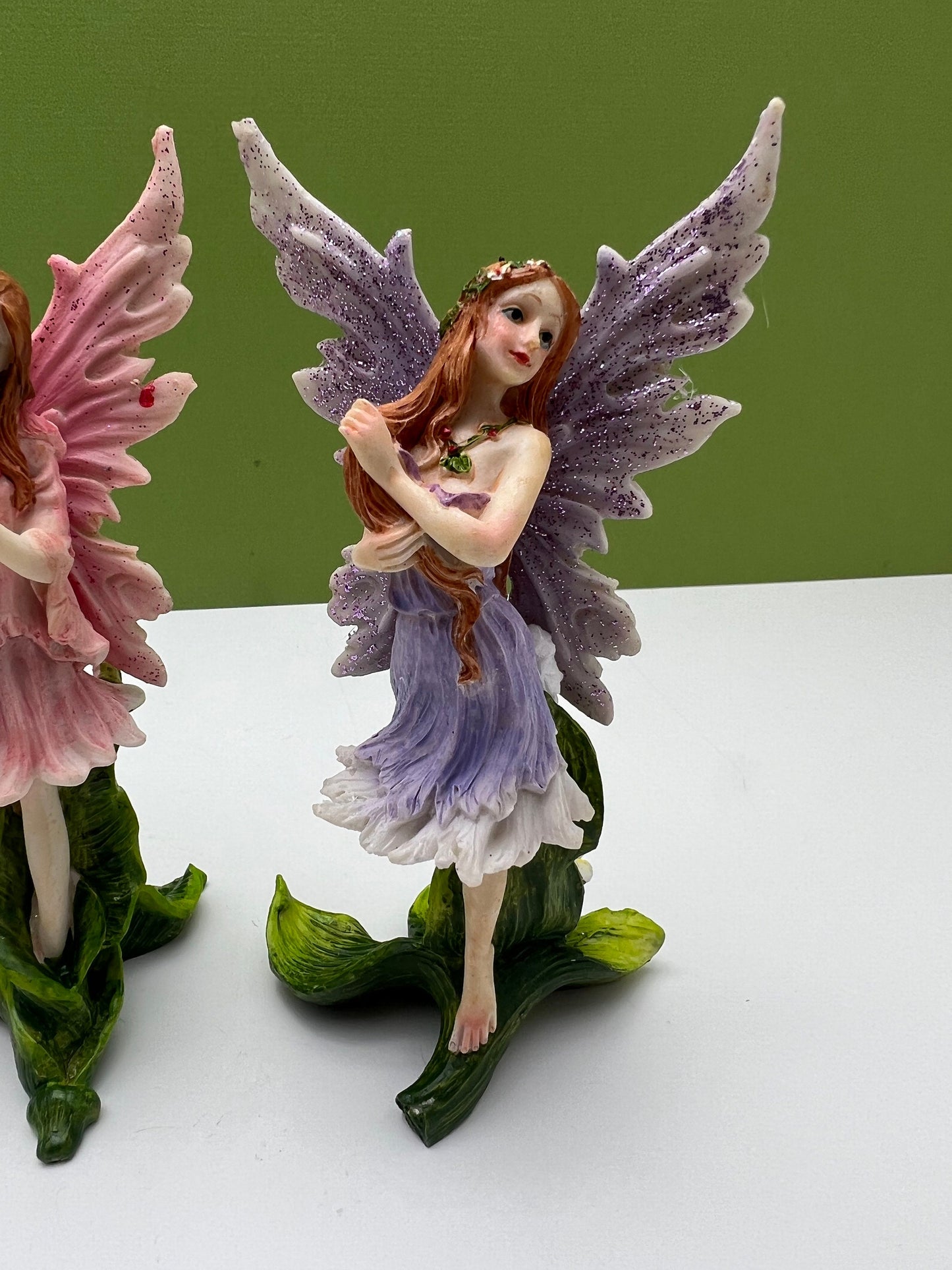 Glitter Fairies Standing on Flowers