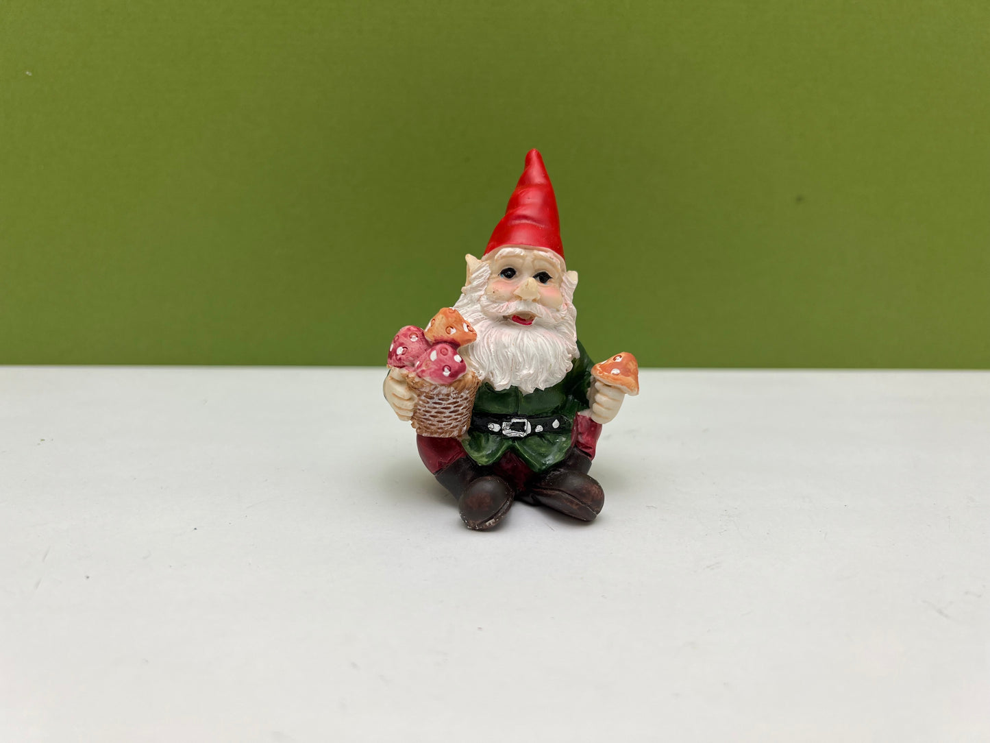 Gnome Figurine Holding Mushrooms