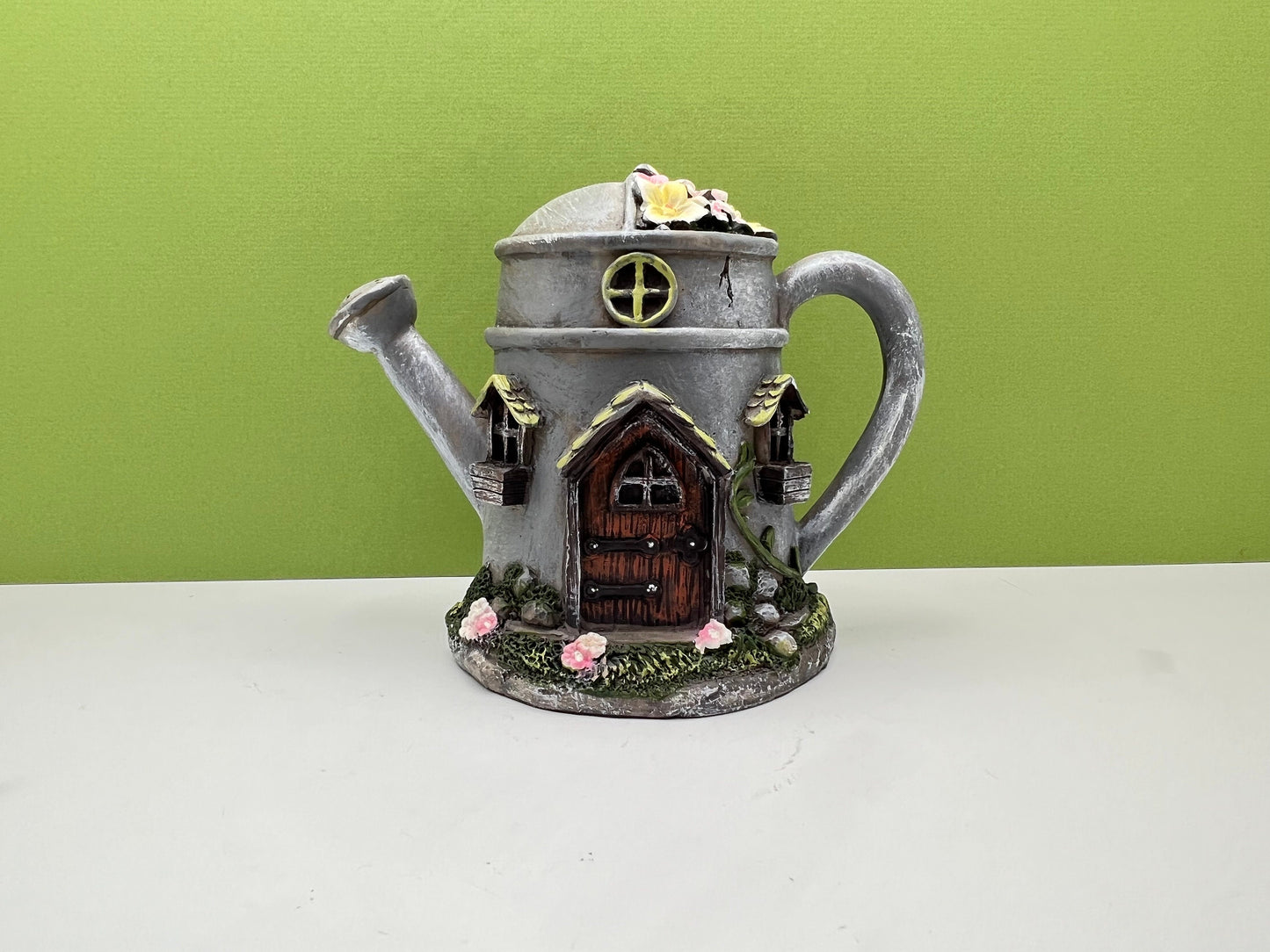 Water Can Flower House