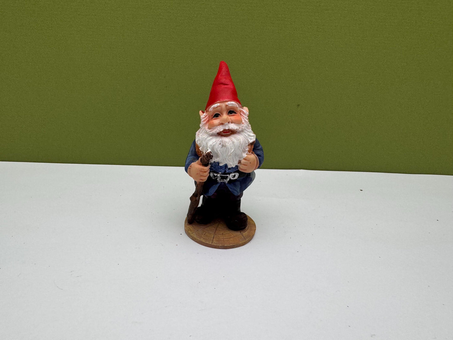 Gnome Holding Stick