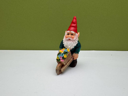 Gnome Holding Wheelbarrow